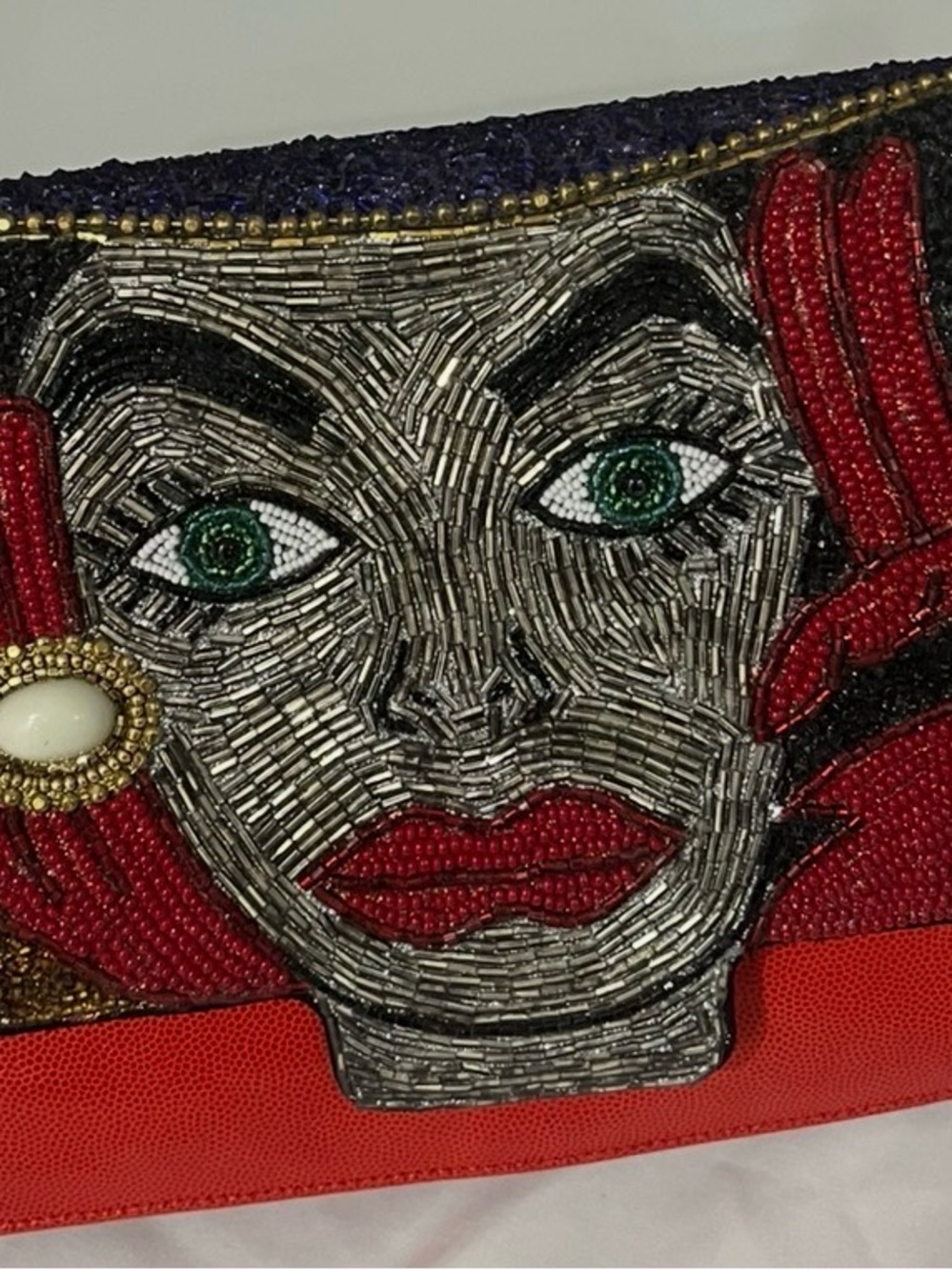Red Beaded Shoulder Bag with Artistic Face Motif